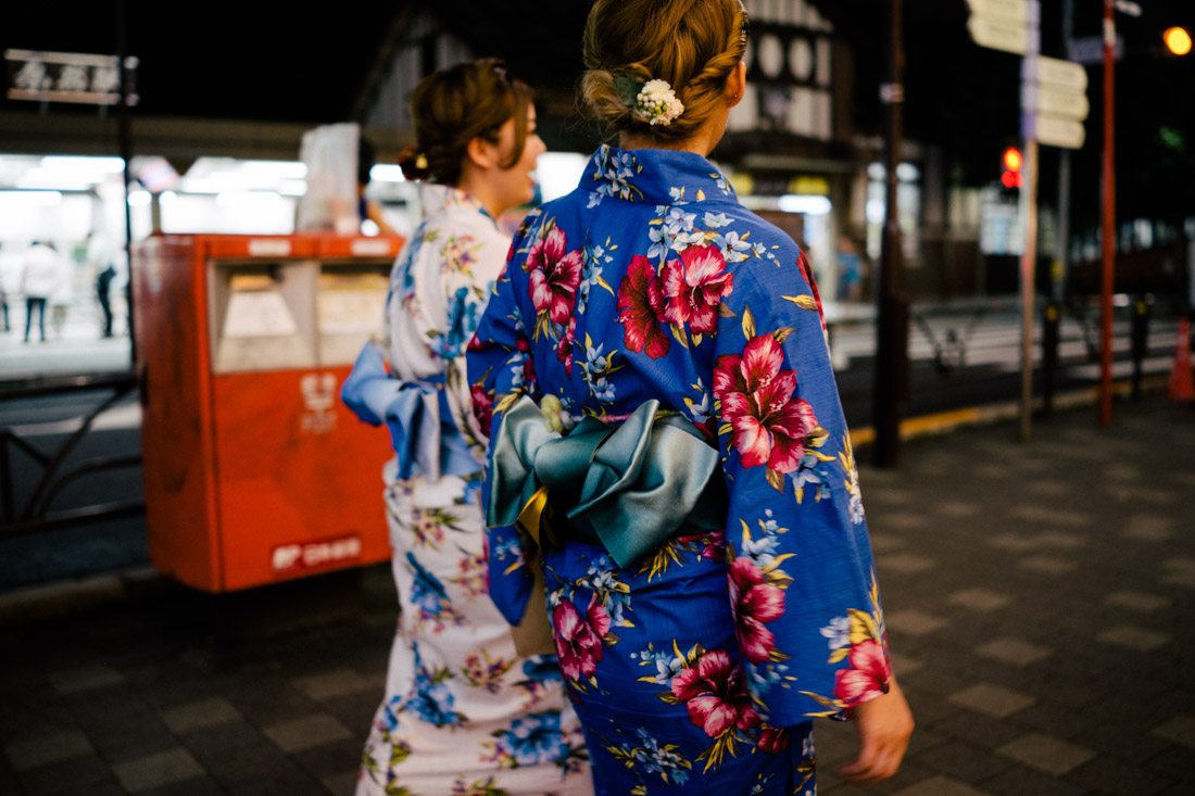 Walking kimonos late at night at Harajuku.