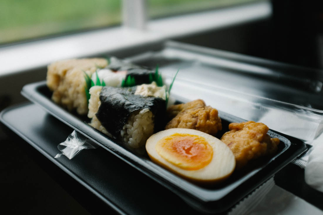 Our small feast: onigiri, fried chicken and soy egg